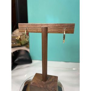 SOLD! 14k yellow gold oval hoop earrings